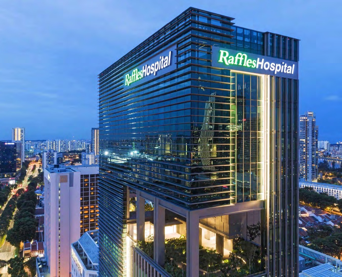 Raffles Hospital Pudong — comprehensive A-class hospital building at dusk in Shanghai